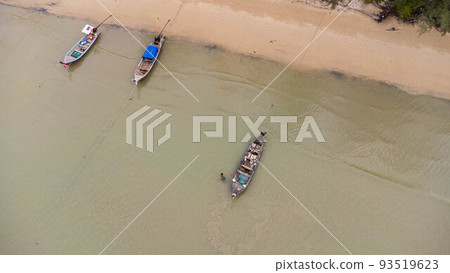 Many fishing boats near the seashore in tropical islands. Pier of the villagers on the southern island of Thailand. top view from drones. 93519623
