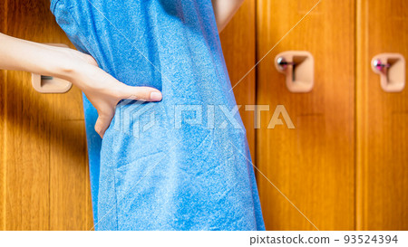 Image cut of a young woman getting ready in a gym locker 93524394