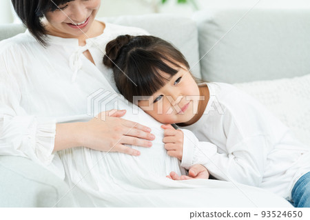 Woman pregnant with second child 93524650