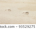 Footprints remaining on the beach 93529275