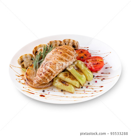Plate of grilled chicken with vegetables isolated on white background Plate of grilled chicken with vegetables isolated on white background 93533288