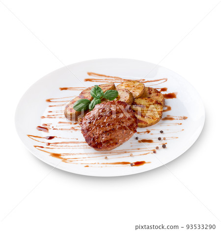 Grilled steak, baked potatoes, green basil and sauce on white plate Grilled steak, baked potatoes, green basil and sauce on white plate 93533290