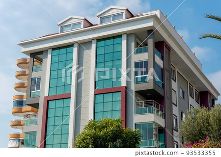 Low angle view of an apartment building with balconies. Low angle view of an apartment building with balconies. 93533355