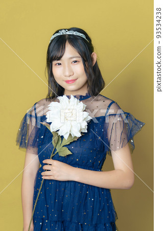 girl in a dress with flowers girl in a dress with flowers 93534238