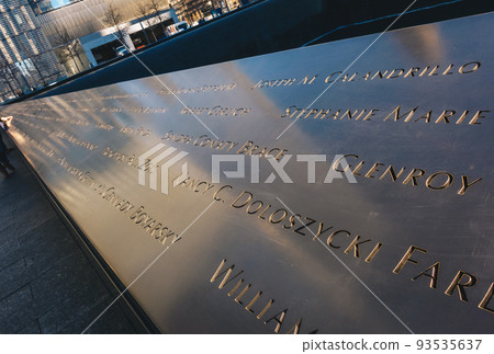 New York City, USA Ground Zero 9/11 Memorial geometric architecture and buildings. The Memorial honors people killed in the terror attacks of September 11, 2001 93535637