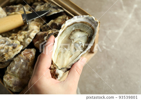 Concept of delicious seafood, oysters, close up 93539801