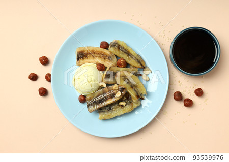 Concept of tasty food with grilled banana on beige background 93539976