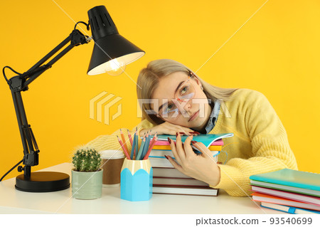 Concept of preapring to exams and tests with student girl Concept of preapring to exams and tests with student girl 93540699