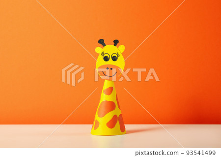 Concept of World Children's Day against orange background 93541499