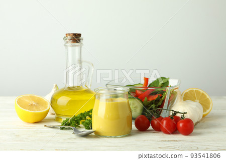 Concept of tasty food with sauce on white wooden table Concept of tasty food with sauce on white wooden table 93541806
