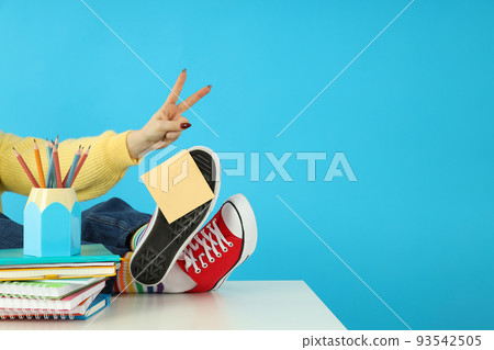 Concept of preparing to exams or tests on blue background Concept of preparing to exams or tests on blue background 93542505