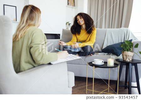Young african american woman has session with her psychologist. Young african american woman has session with her psychologist. 93543457