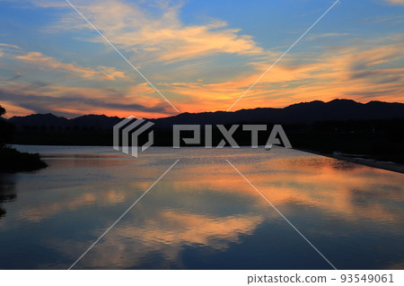 Sunset sky (reflection on the river) - Stock Photo [93549061] - PIXTA