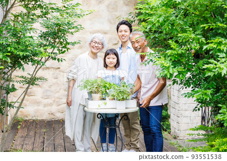Gardening together as a three-generation family Gardening together as a three-generation family 93551538