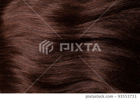 Closeup view of colored brown hair, haircare background 93553731