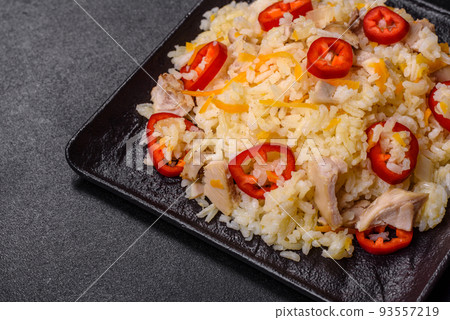 Homemade chinese fried rice with vegetables and a chicken Homemade chinese fried rice with vegetables and a chicken 93557219