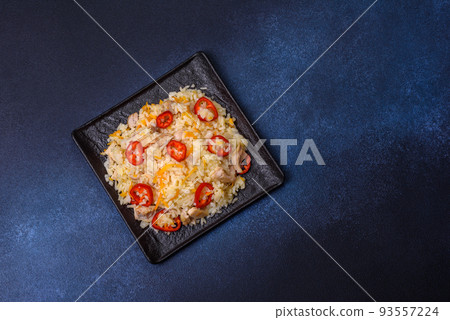 Homemade chinese fried rice with vegetables and a chicken Homemade chinese fried rice with vegetables and a chicken 93557224