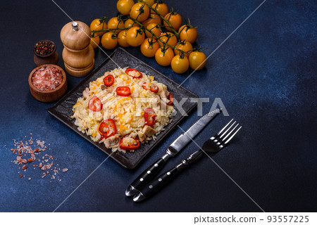 Homemade chinese fried rice with vegetables and a chicken Homemade chinese fried rice with vegetables and a chicken 93557225