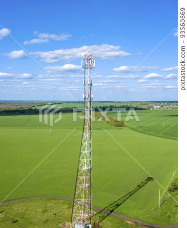 aerial photo of a mobile phone tower on the background of a beautiful landscape 93560869