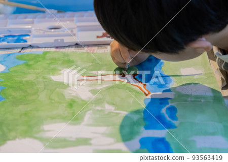 boy painting with paint boy painting with paint 93563419