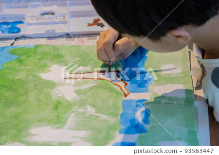 boy painting with paint 93563447