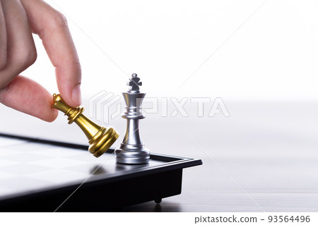 Business woman play Chess to success. Leader use strategy game to challenge competitor with intelligence leadership power to move King to victory with management team idea battle to win, copy space Business woman play Chess to success. Leader use strategy game to challenge competitor with intelligence leadership power to move King to victory with management team idea battle to win, copy space 93564496