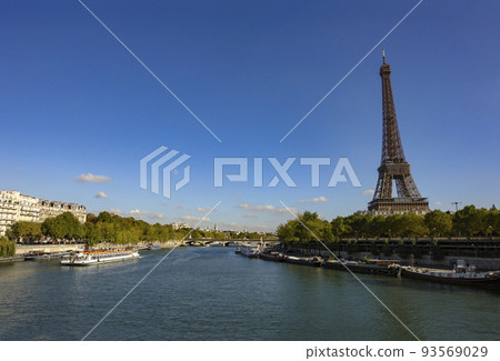 Seine river in Paris, tourist boat and Eiffel Tower (World Heritage) Seine river in Paris, tourist boat and Eiffel Tower (World Heritage) 93569029