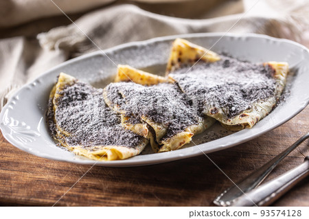 Traditional Slovak and Czech potato dumplings with popy seeds and sugar. Traditional Slovak and Czech potato dumplings with popy seeds and sugar. 93574128