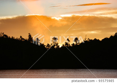 Northern Yatsugatake in summer, morning glow of Shirakoma Pond, Nagano Prefecture, Japan Northern Yatsugatake in summer, morning glow of Shirakoma Pond, Nagano Prefecture, Japan 93575985