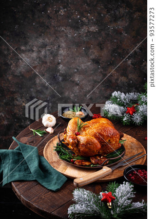 Christmas baked chicken for festive dinner. Christmas baked chicken for festive dinner. 93577273