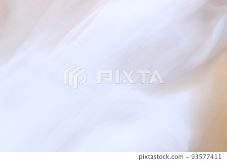 white smooth tulle fabric on brown background 93577411