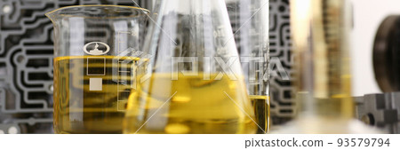 Test tube chemistry flask against of hydroblock acp with yellow liquid Test tube chemistry flask against of hydroblock acp with yellow liquid 93579794