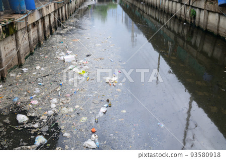 Garbage on waste water in canal 93580918
