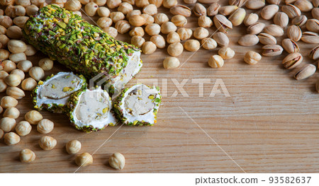 Nuts and halva on the table 93582637