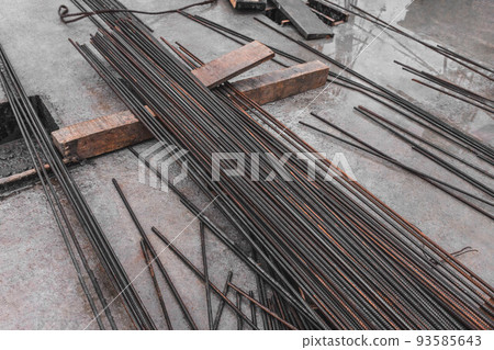 Lots of rebar at the construction site. Concrete reinforcement materials Lots of rebar at the construction site. Concrete reinforcement materials 93585643