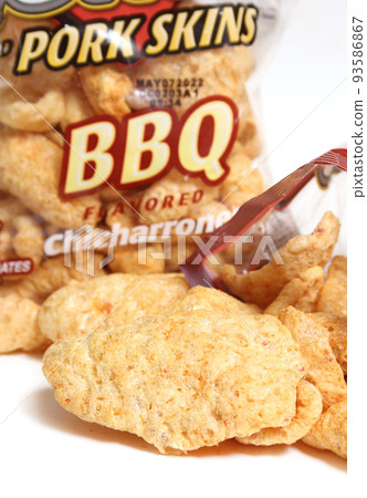 Chicharrones is Spanish for Fried Pork Skin Bag in Background Shallow DOF 93586867