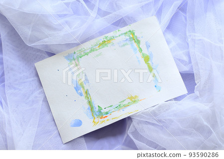 empty paper sheet with aquarelle on white tulle with purple background empty paper sheet with aquarelle on white tulle with purple background 93590286