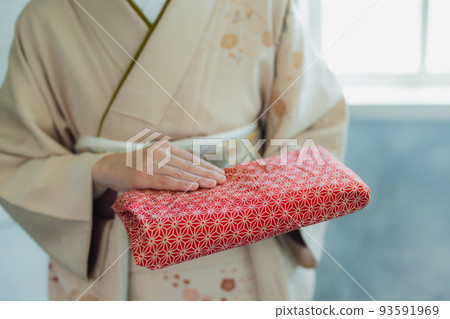 Static shot of Happy young woman listening music through headphones in darkroom