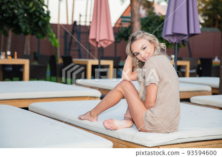 Nice blonde wearing a long t-shirt Nice blonde wearing a long t-shirt 93594600