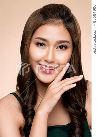Closeup portrait of ardent young girl with healthy skin posing beauty gesture. 93594906