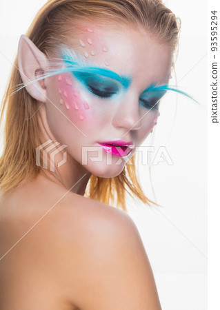 Charming blonde in the image of an elf Charming blonde in the image of an elf 93595294