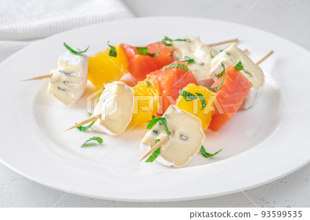 Skewers with cheese and trout 93599535