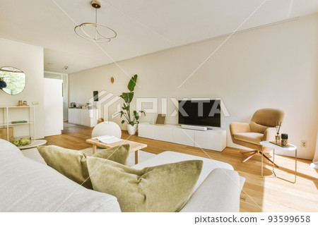 Interior design of modern minimalist style living room with large windows and wooden couch and cabinet and TV placed on white wall 93599658