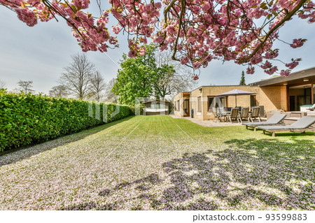 Neat patio with sitting area 28 5 Neat paved patio with sitting area and small garden near wooden fence Neat patio with sitting area 28 5 Neat paved patio with sitting area and small garden near wooden fence 93599883