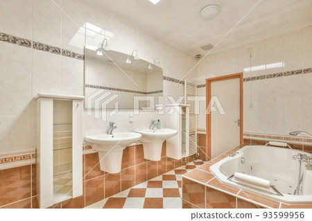 Stylish bathroom interior design with white toilet and bathtub with glass shower in modern apartment Stylish bathroom interior design with white toilet and bathtub with glass shower in modern apartment 93599956