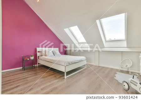 Interior of contemporary bedroom with white walls in attic of house Interior of contemporary bedroom with white walls in attic of house 93601424