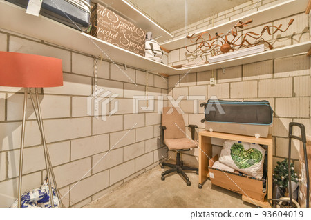 Front view of old brick buildings and cars with bicycles from small balcony with railings Front view of old brick buildings and cars with bicycles from small balcony with railings 93604019