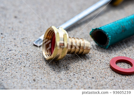 new garden hose replacement connection and pipe mender to tighten and secure repair. new garden hose replacement connection and pipe mender to tighten and secure repair. 93605239