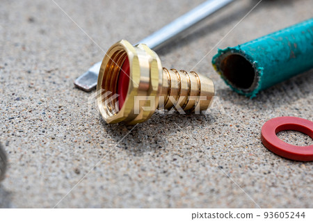 new garden hose replacement connection and pipe mender to tighten and secure repair. new garden hose replacement connection and pipe mender to tighten and secure repair. 93605244