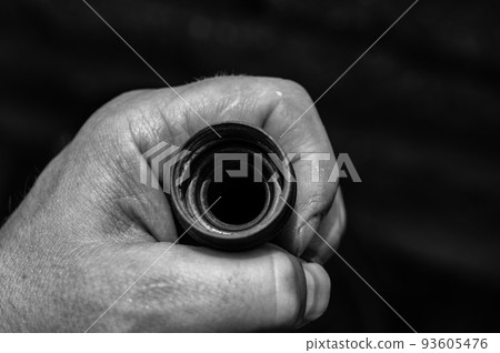 Looking into a garden hose that is missing the rubber gasket for sealing connections Looking into a garden hose that is missing the rubber gasket for sealing connections 93605476